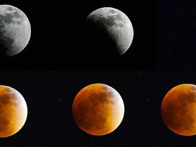 Les différentes étapes d'une éclipse totale de Lune, comme vue de Bogota en Colombie, le 27 septembre 2015 - LUIS ACOSTA [AFP/Archives]