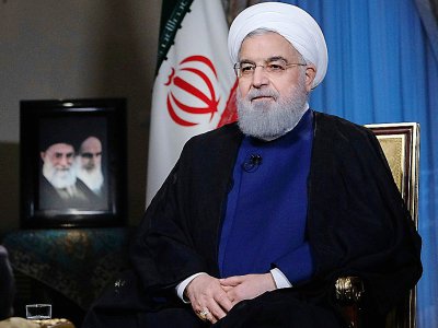 Une photo fournie par la présidence iranienne montre le président Hassan Rohani donnant une interview le 6 août 2018 à la télévision iranienne à Téhéran - - [Iranian Presidency/AFP]