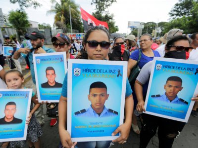 Des partisans du président du Nicaragua Daniel Ortega manifestent à Managua le 11 août 2018 - INTI OCON [AFP]