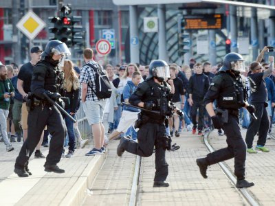 La police anti-émeutes en action le 26 août 2018 à Chemnitz dans l'est de l'Allemagne - Andreas SEIDEL [dpa/AFP]