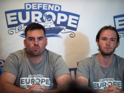 Jean David Cattin (g) et  Damiano Gioranna, militants d'extrême droite, en conférence de presse le 19 août 2017, à Lyon - ROMAIN LAFABREGUE [AFP/Archives]