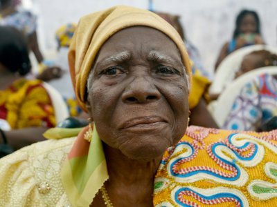 La presque centenaire Jeanne Danho Yace fête son anniversaire à Grand-Jacques en Côte d'Ivoire, le 4 août 2018 - SIA KAMBOU [AFP]