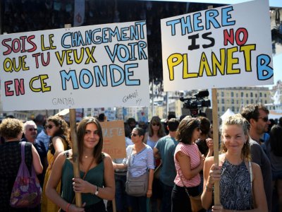 Banderoles de manifestants appelant à lutter contre le réchauffement climatique, lors de la marche pour le climat, à Marseille le 8 septembre 20180 - Christophe SIMON [AFP]
