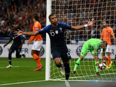 La joie de l'attaquant vedette des Bleus Kylian Mbappé après avoir ouvert le score contre les Pays-Bas au Stade de France, le 9 septembre 2018 - Anne-Christine POUJOULAT [AFP]