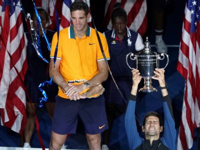 Novak Djokovic (d) et Juan Martin del Potro (g) après la finale de l'US Open, dimanche 9 septembre 2018 à New York. - kena betancur [AFP]