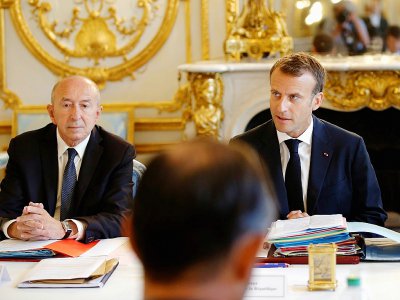 Emmanuel Macron et Gérard Collomb lors du conseil des ministres du 3 août 2018 - Michel Euler [POOL/AFP/Archives]