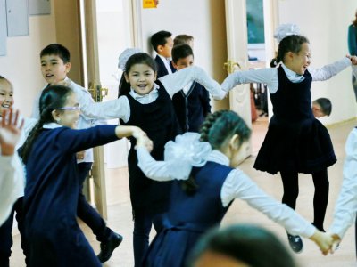 Des enfants jouent à l'école numéro 76 à Astana au Kazakhstan, le 25 septembre 2018 - Stanislav FILIPPOV [AFP]