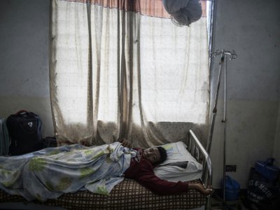 Ronaldo Mbuh sur son lit d'hôpital à Buea, le 4 octobre 2018 - MARCO LONGARI [AFP]