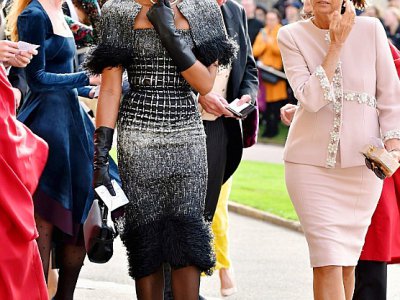Le mannequin Naomi Campbell (g) arrive au mariage de la princesse Eugenie et de Jack Brooksbank à la chapelle St George à Windsor, le 12 octobre 2018 - Matt Crossick [POOL/AFP]