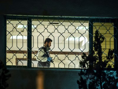 Un enquêteur turc prend des photos à l'intérieur du consulat saoudien, le 15 octobre 2018 à Istanbul - Bulent KILIC [AFP]