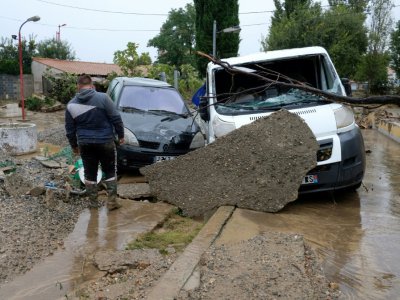 Maisons et véhicules ont été endommagés pendant les inondations à Trèbes, le 16 octobre 2018 - ERIC CABANIS [AFP]