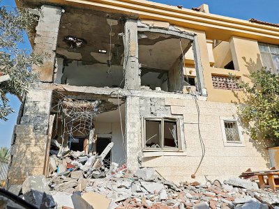 Une maison endommagée par un tir de roquette depuis la bande de Gaza, le 17 octobre 2018 à Beer-Sheva, dans le sud d'Israël - Jack GUEZ [AFP]