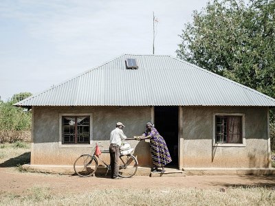Des villageois de Bondo au Kenya qui perçoivent un revenu universel dans le cadre d'une étude de long terme, le 3 octobre 2018 - Yasuyoshi CHIBA [AFP]