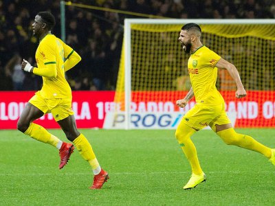 Le Nantais Abdoulaye Touré (g) exulte, suivi par son coéquipier Lima, après avoir marqué contre Marseille, le 5 décembre 2018 à Nantes - SEBASTIEN SALOM GOMIS [AFP]