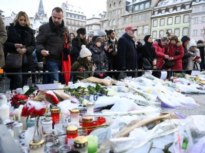 Dépôts de cierges et de fleurs en hommages aux victimes de l'attaque, à Strasbourg, le 16 décembre 2018 - SEBASTIEN BOZON [AFP]