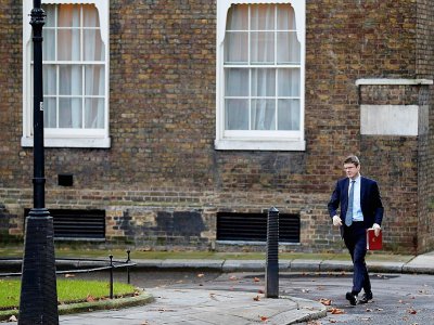 Le ministre des Entreprises Greg Clark arrive au 10, Downing Street à Londres le 17 décembre 2018, avant une déclaration de la Première ministre Theresa May à la chambre des Communes - Adrian DENNIS [AFP]