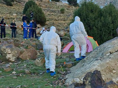 Des enquêteurs sur le site du meurtre de deux randonneuses scandinaves dans le sud du Maroc, près d'Imlil le 18 décembre 2018. Capture d'image diffusée par la télévision marociane 2M - - [AFP]