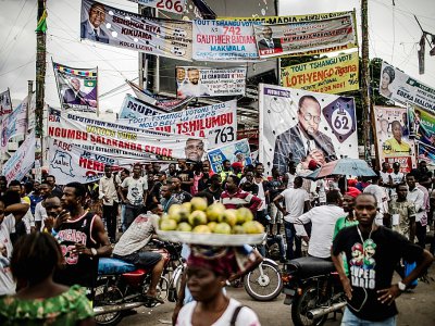 Des affiches électorales pour les scrutins présidentiel, législatifs et provinciaux en République démocratique du Congo, le 19 décembre 2018, à Kinshasa. - Luis TATO [AFP]