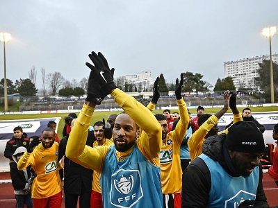 Les joueurs de Lyon Duchère lors de la victoire sur Nîmes en 32e de finale de Coupe de France le 5 janvier 2019 - JEFF PACHOUD [AFP]