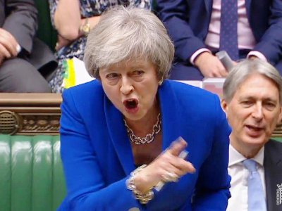 Une capture d'écran d'une séance au parlement britannique montrant la Première ministre Theresa May le 19 décembre 2018 - HO [PRU/AFP]