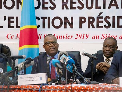 Le président de la commission électorale de RDC Corneille Nangaa, annonce les résultats provisoires de la présidentielle à Kinshasa, le 10 janvier 2019 - Junior D. KANNAH [AFP]