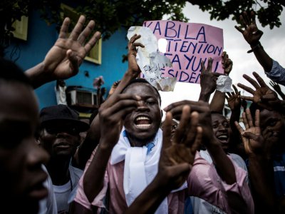 Des partisans de Martin Fayulu manifestent pour dénoncer les résultats de l'élection présidentielle en RDC, le 11 janvier 2019 à Kinshasa - John WESSELS [AFP]