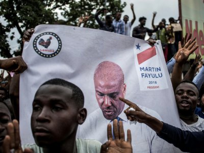 Des partisans de l'opposant congolais Martin Fayulu manifestent contre les résultats de l'élection présidentielle, le 11 janvier 2019 à Kinshasa, en RDC - John WESSELS [AFP]