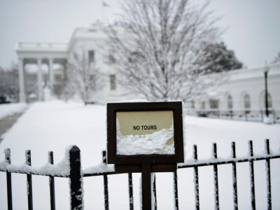 Devant la Maison Blanche enneigée, à Washington, le dimanche 13 janvier 2019, au 23e jour du "shutdown" - Brendan Smialowski [AFP]