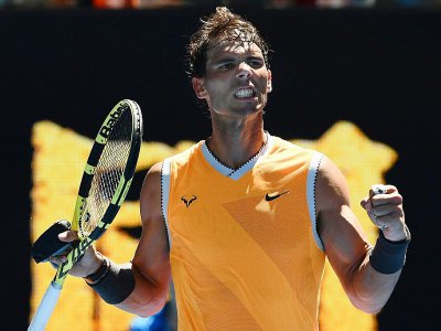 Rafael Nadal célèbre sa victoire dans le premier tour de l'Open d'Australie, le 14 janvier 2019 à Melbourne - Jewel SAMAD [AFP]