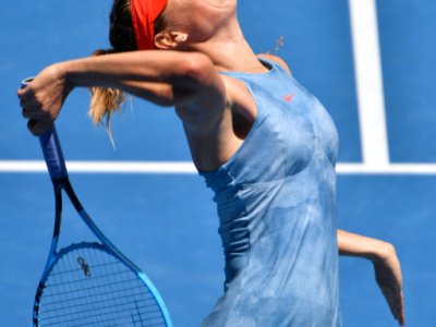 La Russe Maria Sharapova face à l'Australienne Ashleigh Barty lors des 8es de finale de l'Open d'Australie, à Melbourne, le 20 janvie 2019 - SAEED KHAN [AFP]