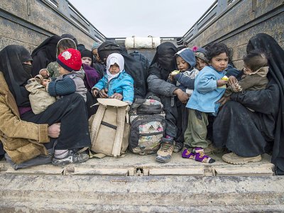 Des femmes et enfants qui ont fui les combats contre le groupe Etat Islamique près de Baghouz, le 14 février 2019 en Syrie - Fadel SENNA [AFP]