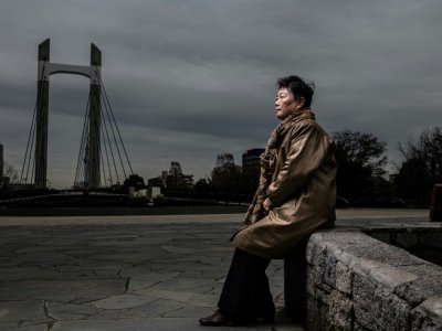 Eiko Kawasaki, qui a quitté le Japon pour Pyongyang à l'âge de 17 ans, pose devant le port de Tokyo, le 11 décembre 2018 - Martin BUREAU [AFP]