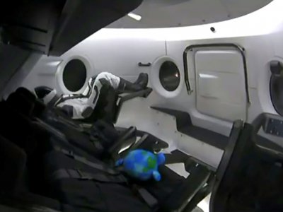 Ripley, le mannequin installé par SpaceX dans sa capsule Crew Dragon, peu avant le décollage le 2 mars 2019 depuis le Centre spatial Kennedy en Floride - HO [SPACEX/AFP]