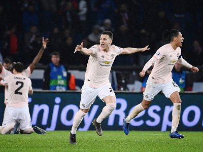 La joie des joueurs de Manchester United après avoir éliminé le PSG en Ligue des champions, le 6 mars 2019 au Parc des Princes - Anne-Christine POUJOULAT [AFP]