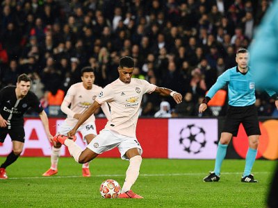 L'attaquant de Manchester United de Marcus Rashford inscrit un penalty en fin de match face au PSG et élimine les Parisiens de la Ligue des champions, le 6 mars 2019 au Parc des Princes - Anne-Christine POUJOULAT [AFP]