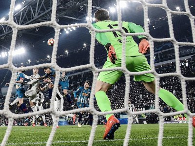 L'attaquant de la Juventus Cristiano Ronaldo (2g) auteur d'un triplé lors de la victoire 3-0 sur l'Atlético Madrid en Ligue des champions le 12 mars 2019 - Marco BERTORELLO [AFP]