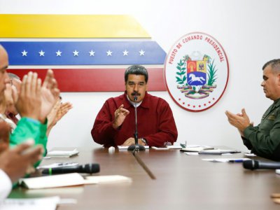 Nicolas Maduro s'entretient avec certains de ses ministres, à Caracas le 12 mars 2019 - HO [Venezuelan Presidency/AFP/Archives]