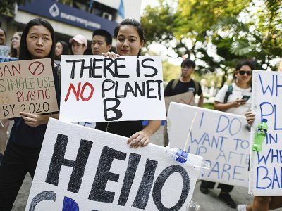 Des manifestants sensibilisent sur le changement climatique, le 15 mars 2019 à Bangkok - Jewel SAMAD [AFP]