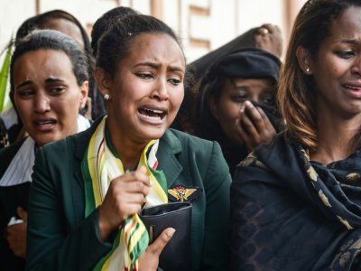 Des proches des victimes du crash à la cathédrale d'Addis Abeba le 17 mars 2019 - - [AFP]