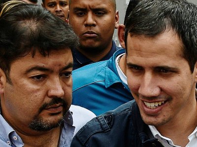 Juan Guaido (d) et son chef de cabinet Roberto Marrero, le 8 mars 2019 à Caracas - Federico Parra [AFP/Archives]