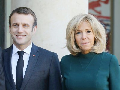Le président Emmanuel Macron et son épouse  Brigitte, à Paris, le 21 janvier 2019 - LUDOVIC MARIN [AFP/Archives]