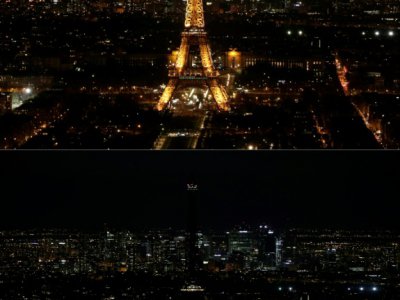 La Tour Eiffel s'éteint pendant une heure pour l'"Earth Hour", le 30 mars 2019 à Paris - Geoffroy VAN DER HASSELT [AFP]