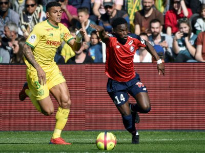 L'attaquant de Lille Jonathan Bamba buteur lors de la victoire 3-2 à Nantes en 30e journée de L1 le 31 mars 2019 - Sebastien SALOM-GOMIS [AFP]