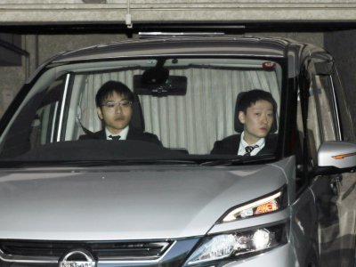 Le véhicule transportant Carlos Ghosn quitte sa résidence à Tokyo, le 4 avril 2019 - JIJI PRESS [JIJI PRESS/AFP]