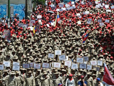Des membres d'une milice dans une manifestation pro-Maduro le 6 avril 2019 à Caracas - Federico Parra [AFP]