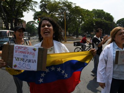 Des partisans de l'opposant et président autoproclamé du Venezuela Juan Guaido, lors d'une manifestation à Caracas le 10 avril 2019 - Yuri CORTEZ [AFP]