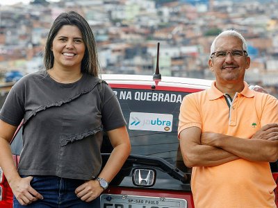 Le Brésilien Alvimar da Silva, fondateur de l'application JaUbra, et sa fille Aline Landim qui travaille avec lui, le 27 février 2019 à Brasilandia, au nord de Sao Paulo - Miguel SCHINCARIOL [AFP]