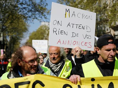 Manifestation de "gilets jaunes" qui préviennent "Macron on attend rien de vos annonces", à Paris, le 13 avril 2019 - Thomas SAMSON [AFP/Archives]