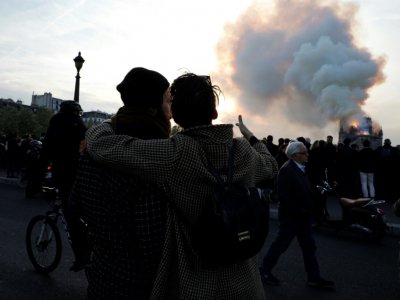 La foule face à l'incendie de Notre-Dame, le 15 avril 2019 - GEOFFROY VAN DER HASSELT [AFP]