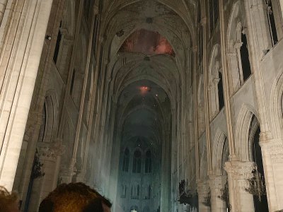 Sonia Krimi a immortalisé l'intérieur de Notre-Dame de Paris, lors de l'incendie du lundi 15 avril 2019, aux côtés du président de la République Emmanuel Macron. - Sonia Krimi